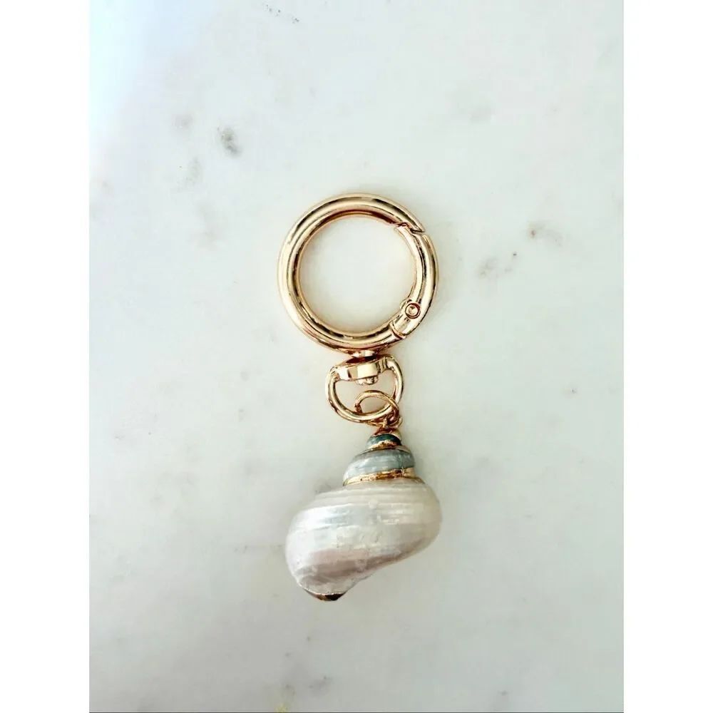Pearlescent with gold trim seashell keychain